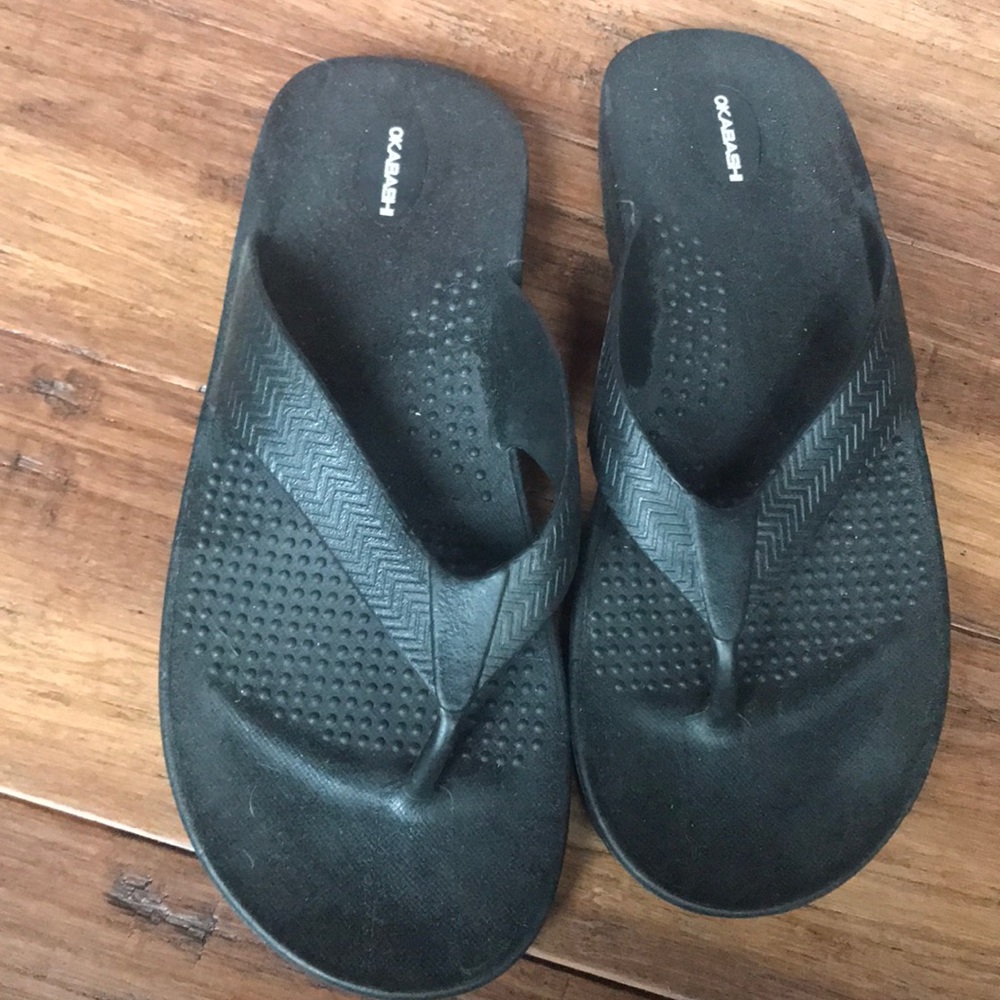 Okbashi black flip flops. Size XL.
